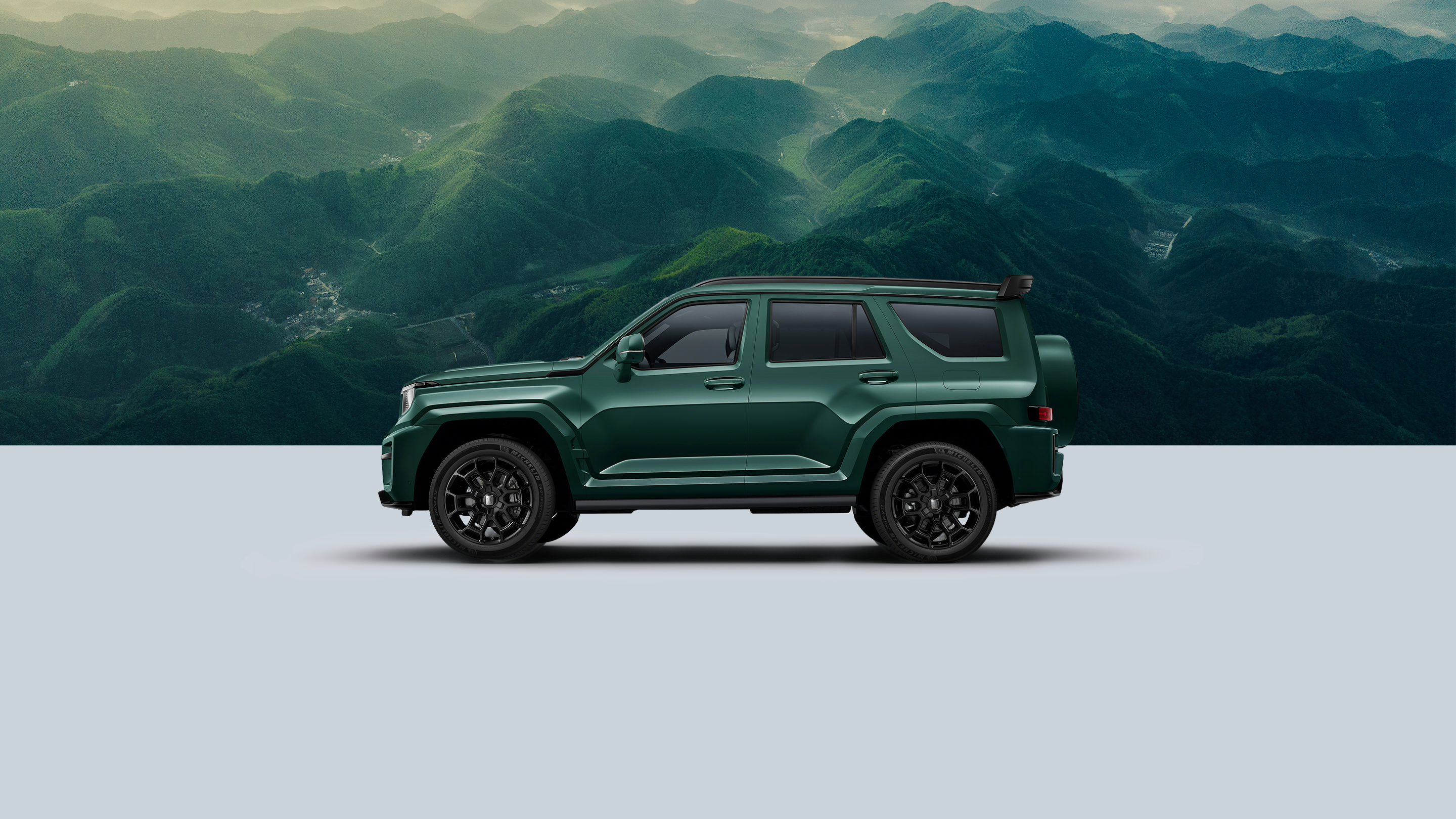 All-new TANK 700 Hi4-T/Z 2026 model in forest green, shown from the right side.