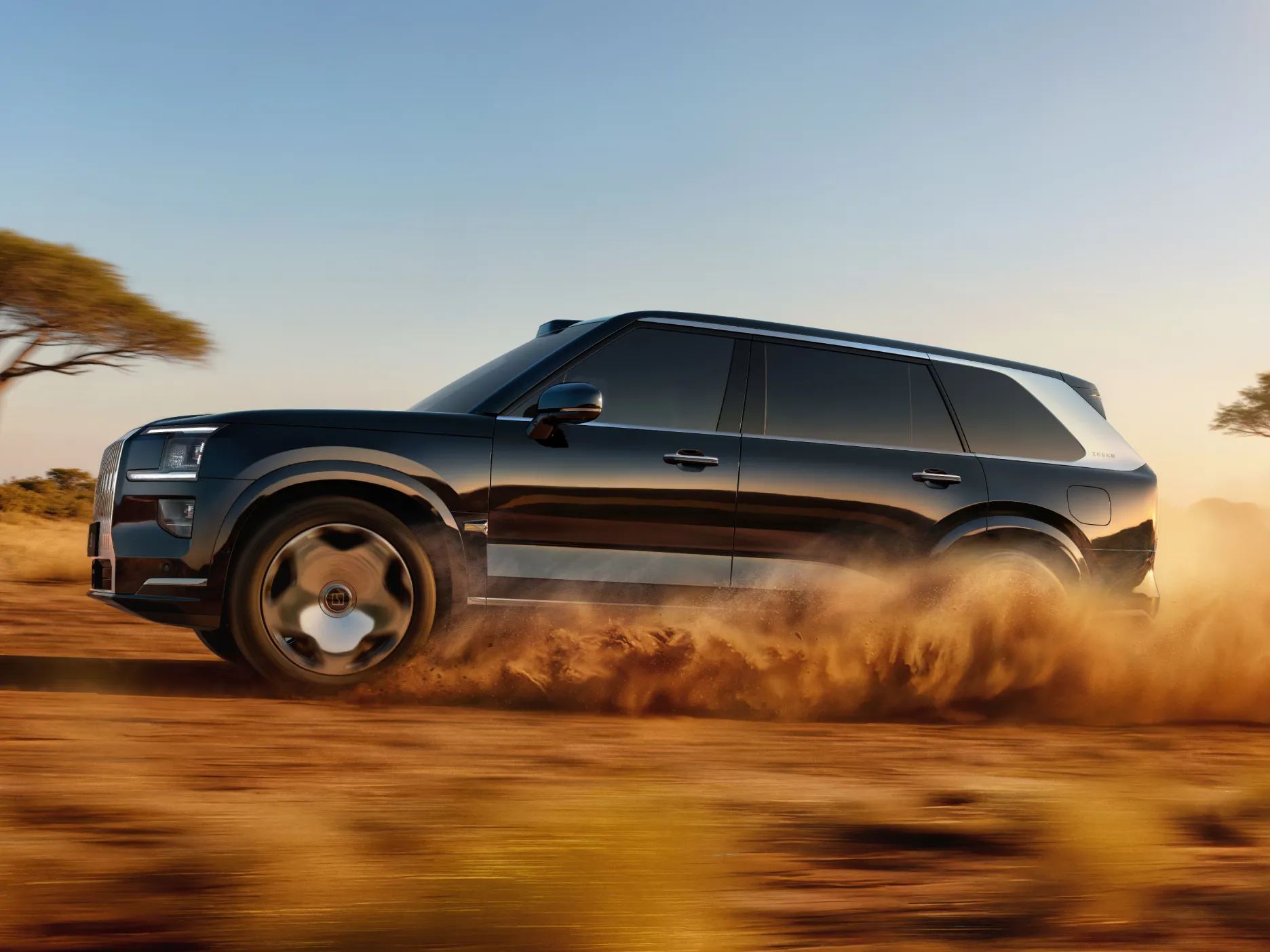 2025 ZEEKR 9X in black driving across desert terrain