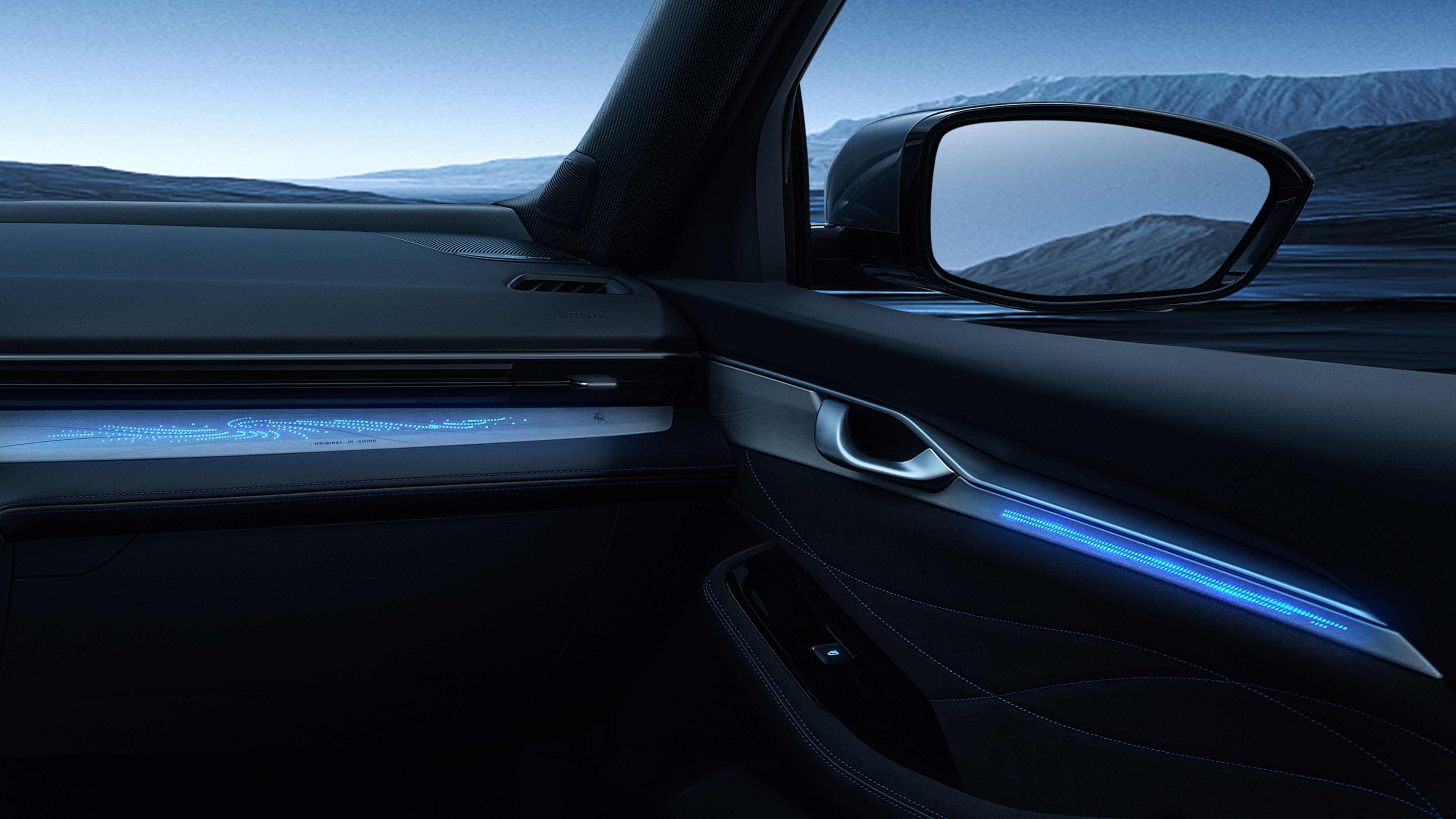 Interior details of GEELY Automobile's PrefaceL 2026 Model, showcasing door-panel design and ambient lighting effects.