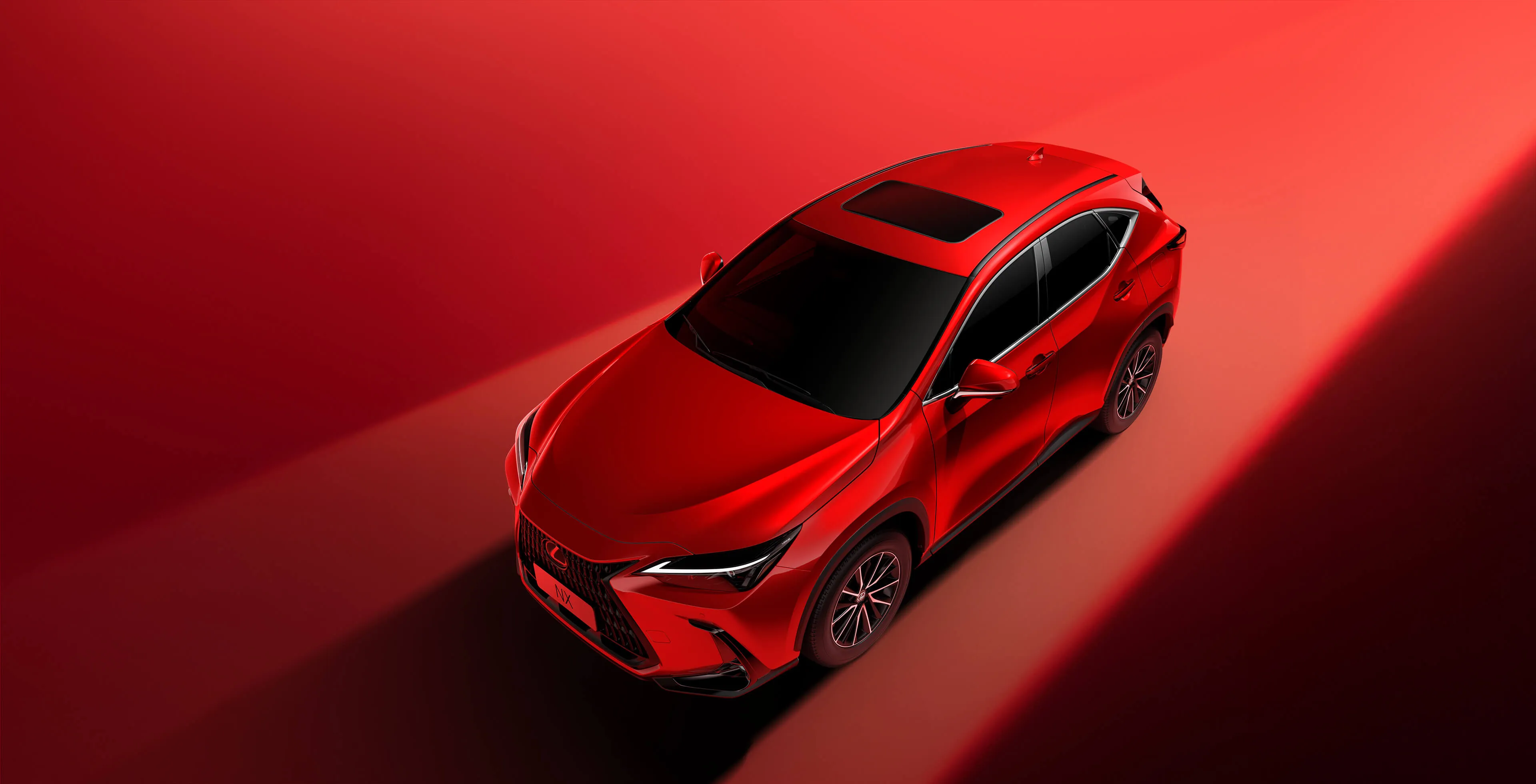 عرض ثابت من الأعلى لسيارة Lexus NX موديل ٢٠٢٦ باللون الأحمر