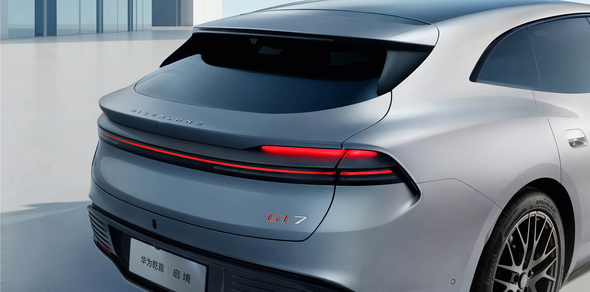Rear three-quarter view of the 2026 Qijing GT7 in silver, photographed in a white studio setting.