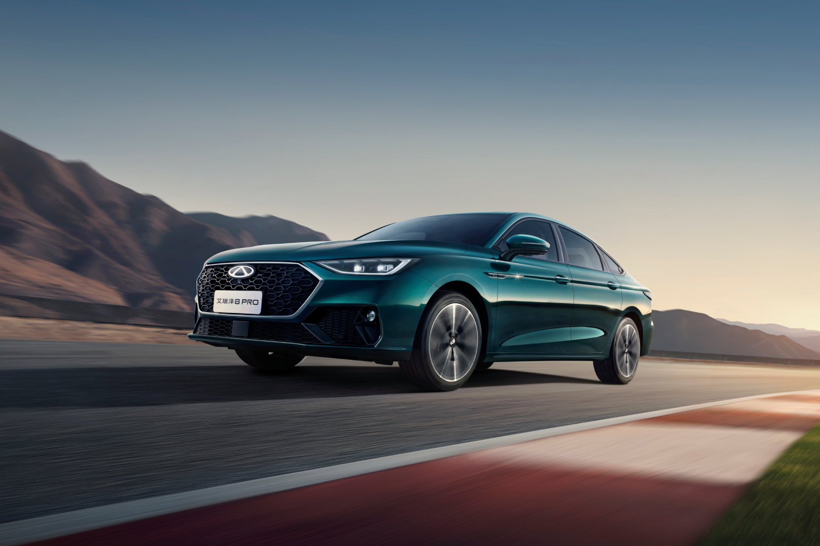 2025 Chery Arrizo 8 PRO in Moss Green, front three-quarter driving shot