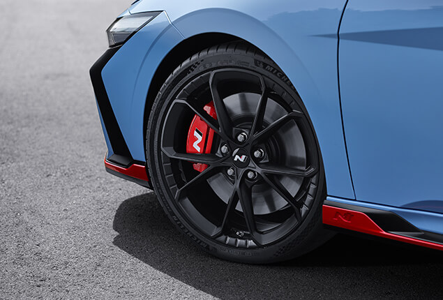 Close-up of Hyundai IONIQ 3 in blue, right side and wheel