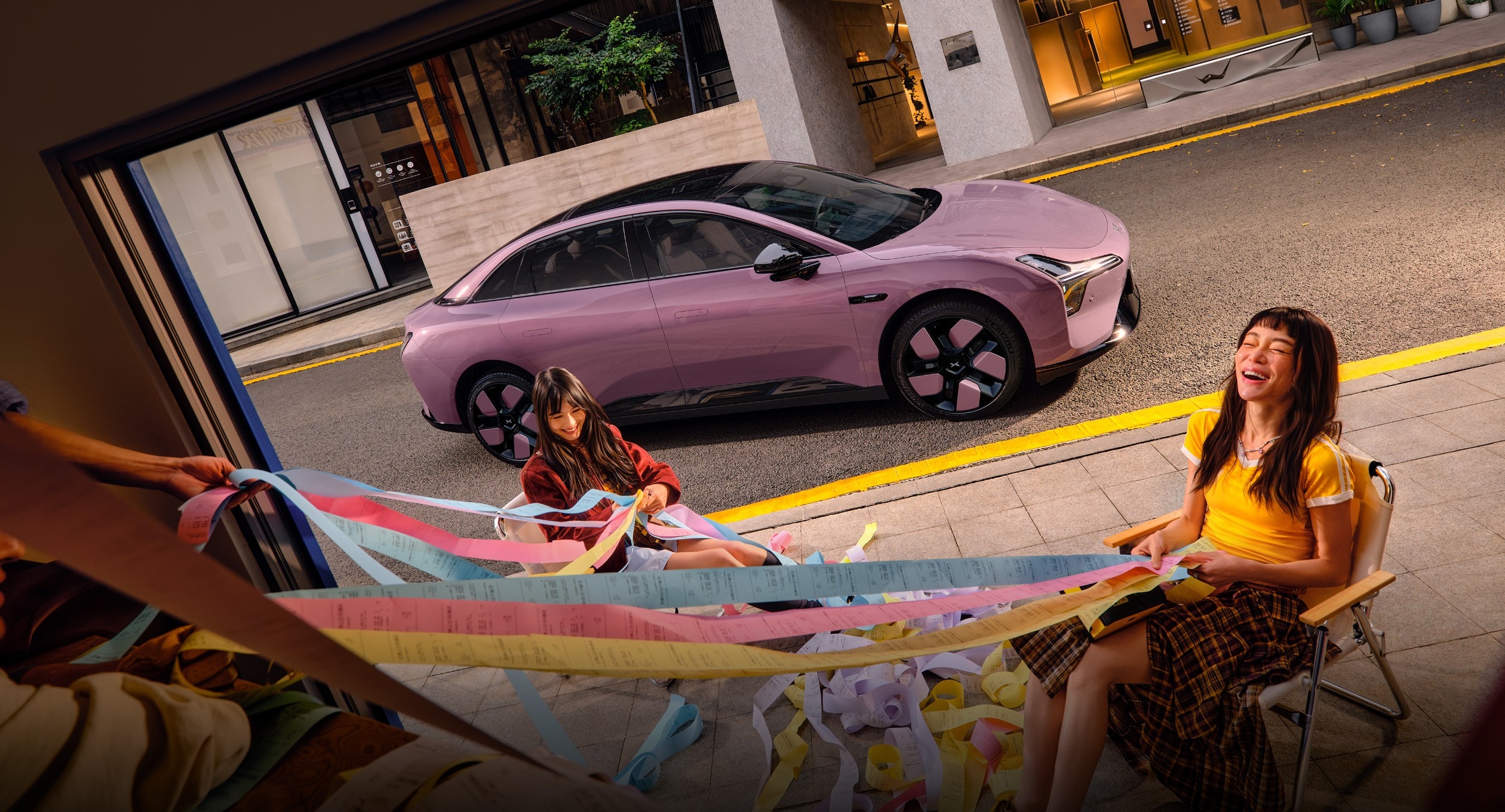 Xpeng MONA M03 2026 model in pink-purple hue parked outdoors
