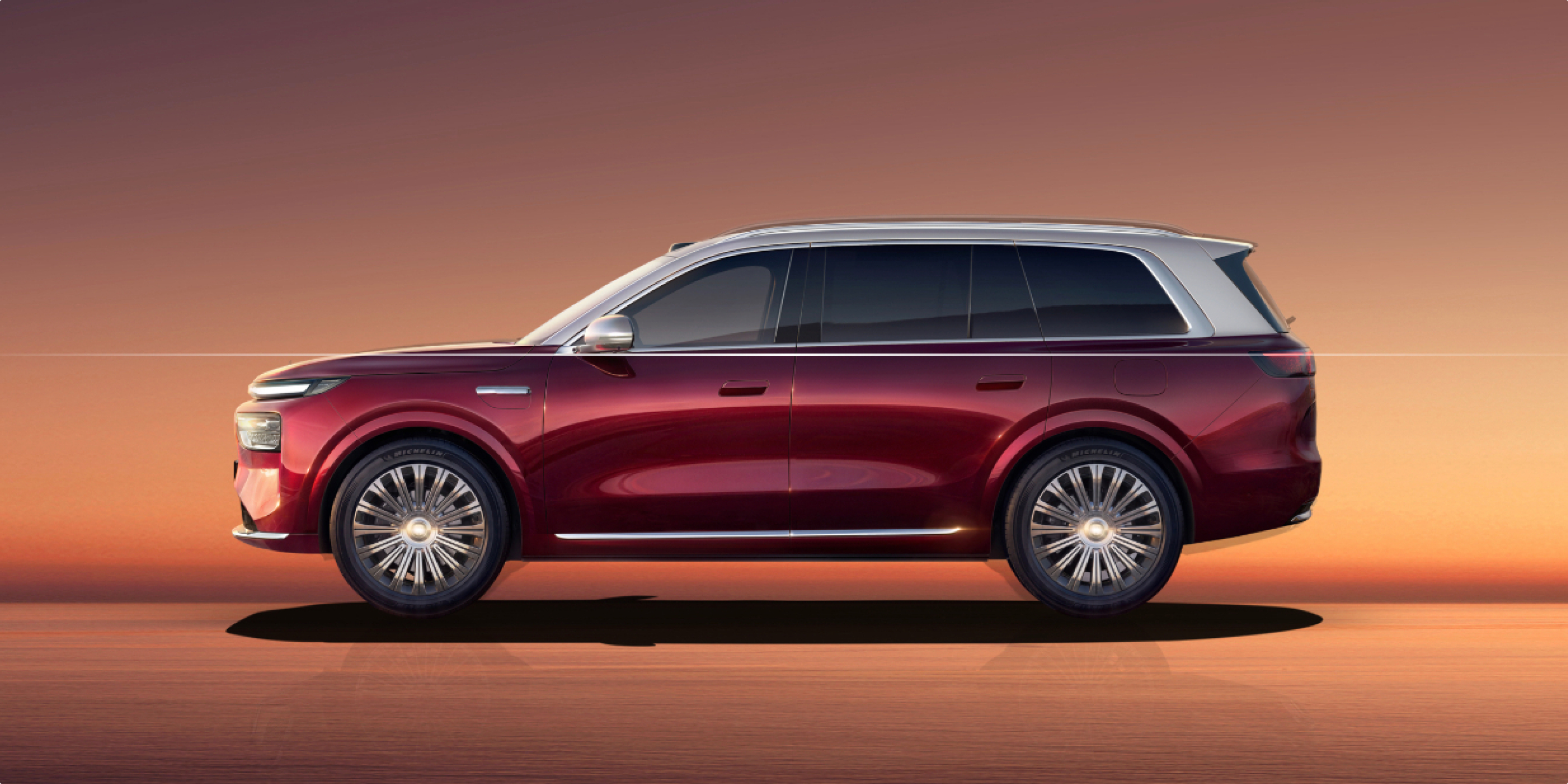 2026 Yijing X9 in red, side view at sunset